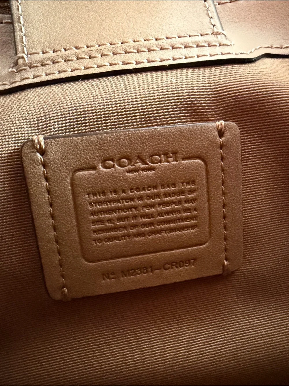Coach Beige Leather Satchel with Raised 'C' Logo